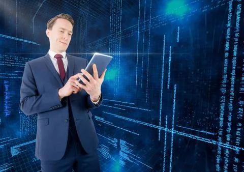 Businessman using digital tablet with binary codes in background Stock Photos
