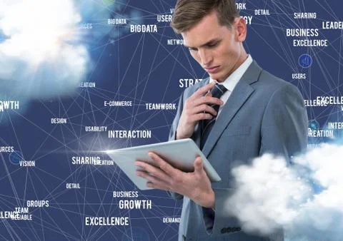 Businessman using digital tablet with connecting icons against blue background Stock Photos