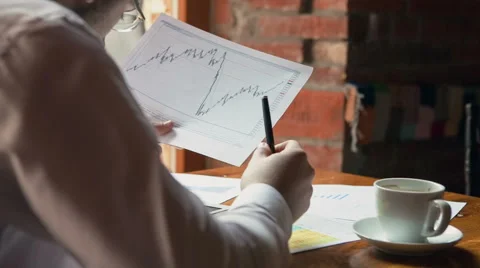 Businessman using digital tablet by the desk Stock Footage 47003534