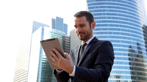 Businessman using a Digital Tablet Stock Footage 56149310