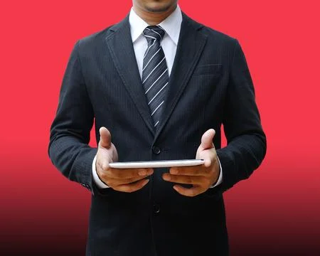 Businessman using digital tablet pc Stock Photos