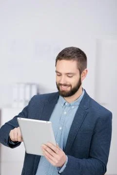 Businessman using digital tablet Stock Photos