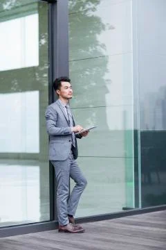 Businessman using digital tablet Stock Photos