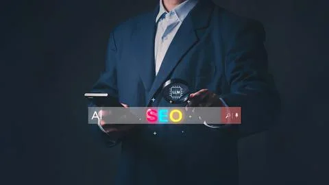 Businessman using digital tablet with seo icons and graphics Stock Photos