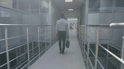 Businessman using elevator Stock-Footage 121160684