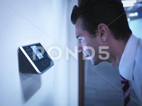 Businessman using face recognition system for office security Stock Photos