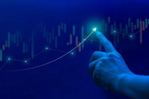 Businessman using finger touch symbol stock graph and chart on virtual screen Stock Photos