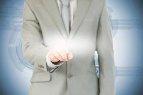 Businessman using futuristic interface Stock Photos