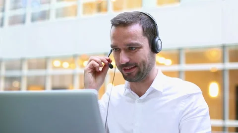 Businessman using a headset Stock Footage 56149295