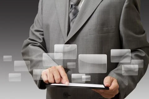 Businessman using his digital tablet Stock Illustration