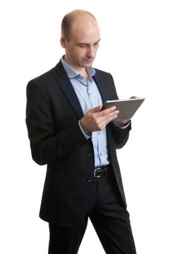 Businessman using his tablet computer Stock Photos