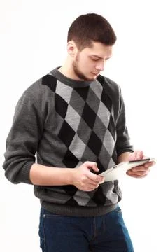 Businessman using his tablet Stock Photos