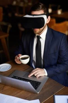 Businessman using interactive simulator for work Foto stock