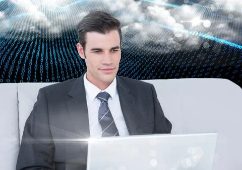 Businessman using laptop against binary codes interface Foto stock