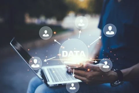 Businessman using a laptop with Analytics and Data Management System on the c Stock Photos