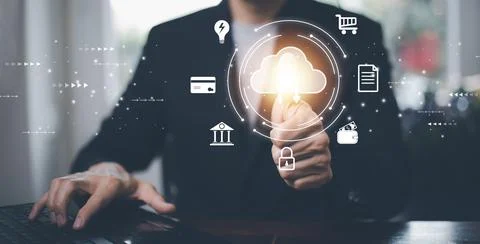 Businessman using laptop with cloud computing and icon online storage concept Foto stock