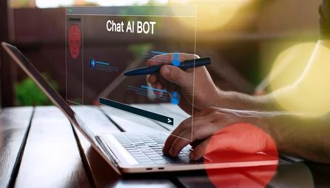 Businessman using a laptop computer chatting AI Stock Photos