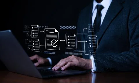 Businessman using laptop computer doing online checklist survey, Stock Photos