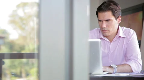 Businessman using laptop computer Stock Footage 63297555