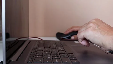 Businessman Using Laptop Computer at Home, Working Online, Freelancing. Stock Footage 246544950