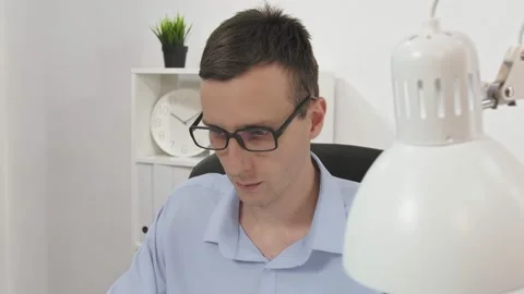 Businessman using laptop computer in new office Video stock 147206636