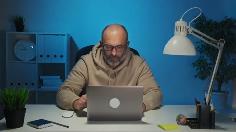 Businessman using laptop computer in new office Stock Footage 147728254