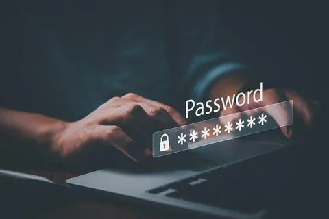 Businessman using laptop computer password cyber security identity theft an.. Foto stock