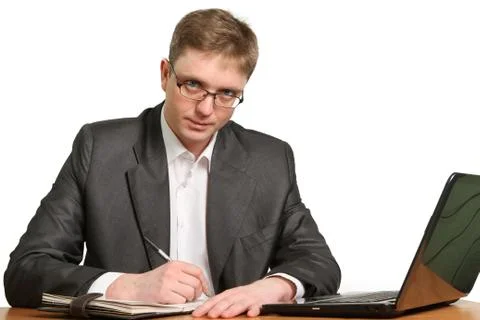 Businessman using laptop computer Stock Photos