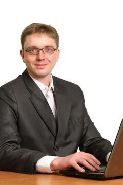 Businessman using laptop computer Stock Photos