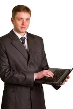 Businessman using laptop computer Stock Photos