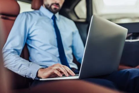 Businessman using laptop computer Stock Photos