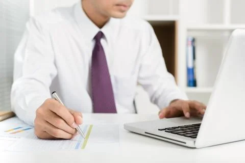 Businessman using laptop computer for work Stock Photos