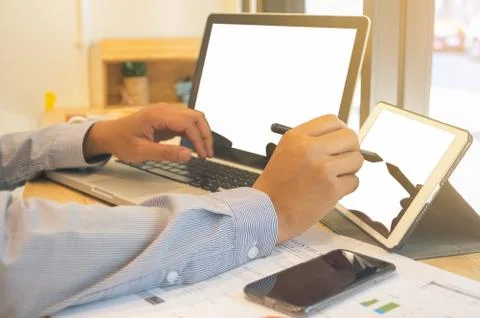 Businessman using laptop computers Stock-Fotos