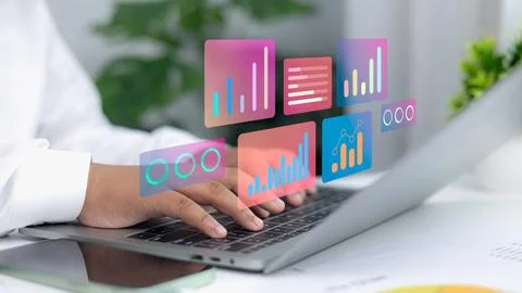 Businessman using laptop with digital data analytics dashboard, futuristic .. Stock Photos