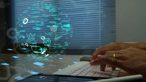 Businessman Using Laptop with Glowing AI and Big Data Graphics Stock Footage 341925120