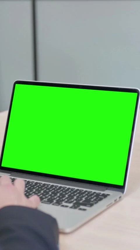 Businessman Using Laptop with Green Screen, vertical video Vidéo 328977650