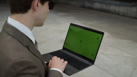 Businessman Using Laptop with Green Screen Chroma Key Mockup Stock Footage 342720590
