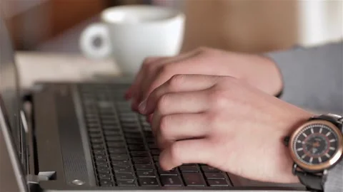 Businessman using laptop at lunchtime Stock Footage 252599023