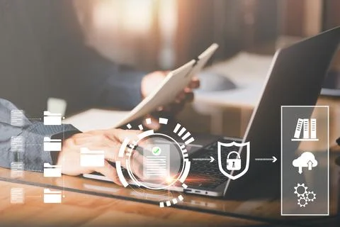 Businessman using laptop to manage documents,Document and database manageme.. Stock Photos