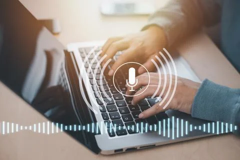 Businessman using laptop with microphone button on virtual screen. Blog blog  Stock Photos