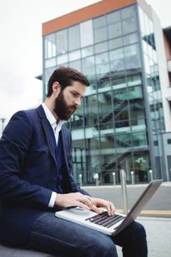 Businessman using laptop Stock Photos