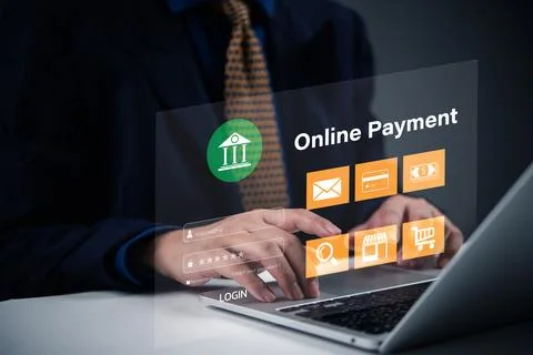 Businessman is using a laptop with a virtual interface displaying online pa.. Stock Photos