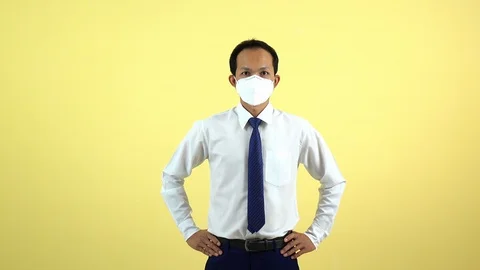 A businessman using a mask for protect an air toxic.  Stock Footage 123777916