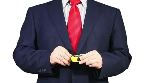 Businessman using a measuring tape. Stock Footage 8600713