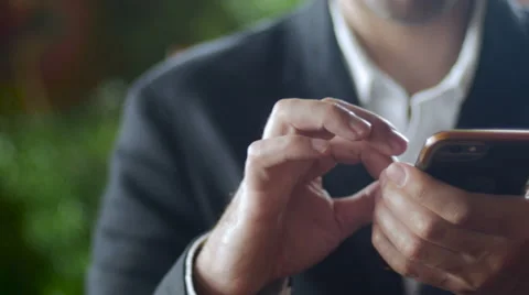 Businessman using mobile phone - dolly Video stock 65338345
