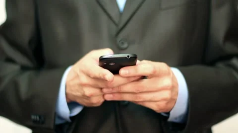 Businessman using mobile phone Stock Footage 8607891