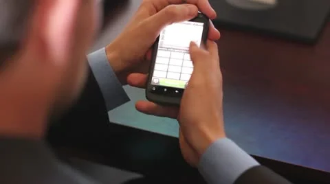 Businessman using mobile phone Stock Footage 8989428