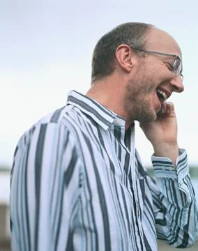 Businessman using mobile phone Stock Photos