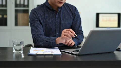 Businessman using mobile phone, tablet.Closeup on blurred background. Stock Footage 313460770