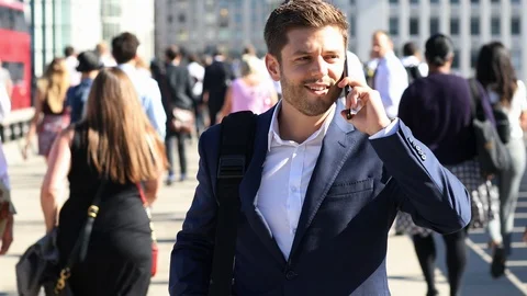 Businessman Using Mobile Phone Walking To Work In Slow Motion Stock Footage 93850113